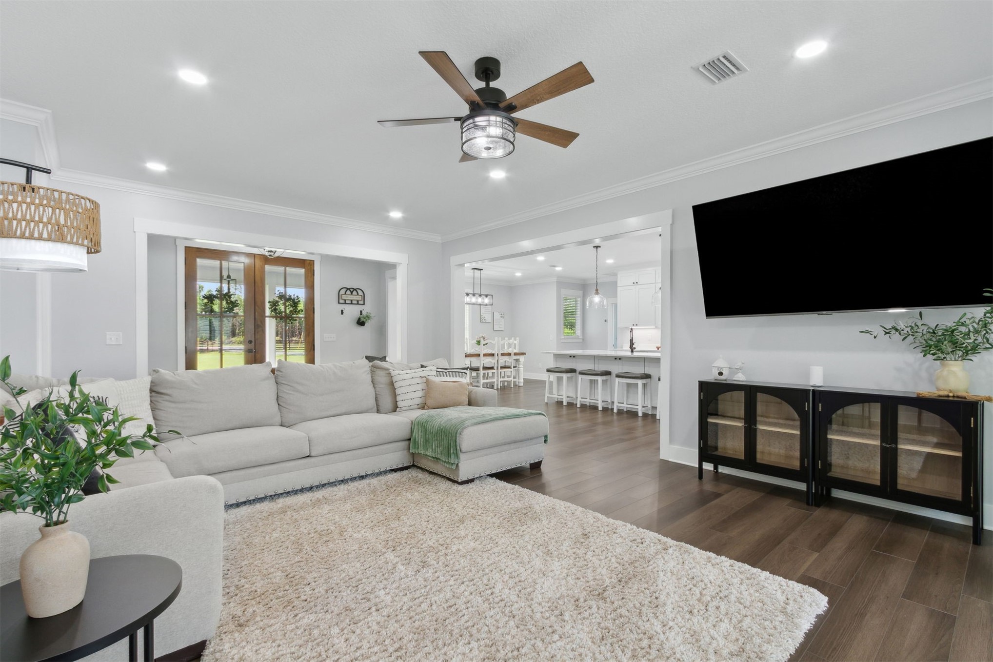 15550 County Road 108 Hilliard, FL 32046 - Photo 15 of 64 a living room with furniture and a flat screen tv