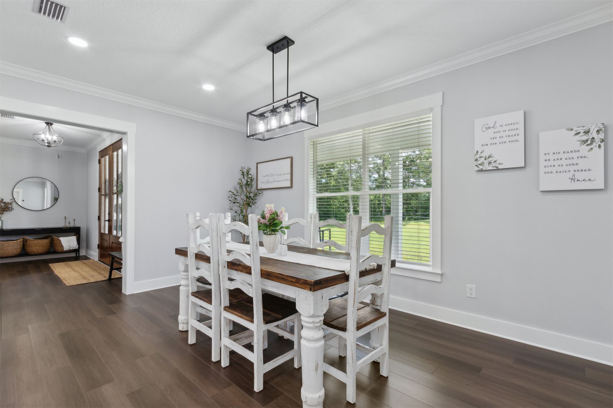 15550 County Road 108 Hilliard, FL 32046 - Photo 17 of 64 a view of a dining room with furniture window and wooden floor