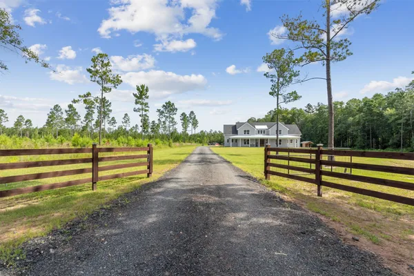 a view of a house with a big yard