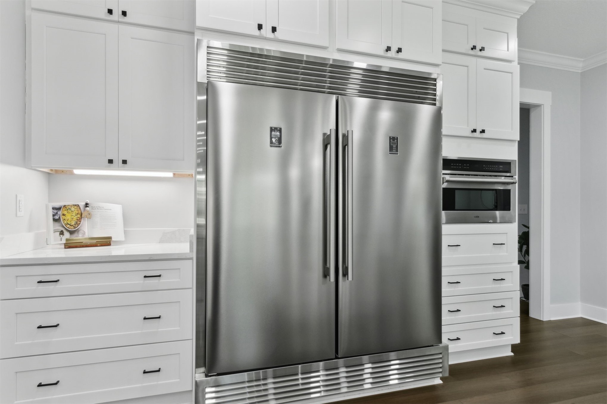 15550 County Road 108 Hilliard, FL 32046 - Photo 23 of 64 a kitchen with refrigerator and cabinets