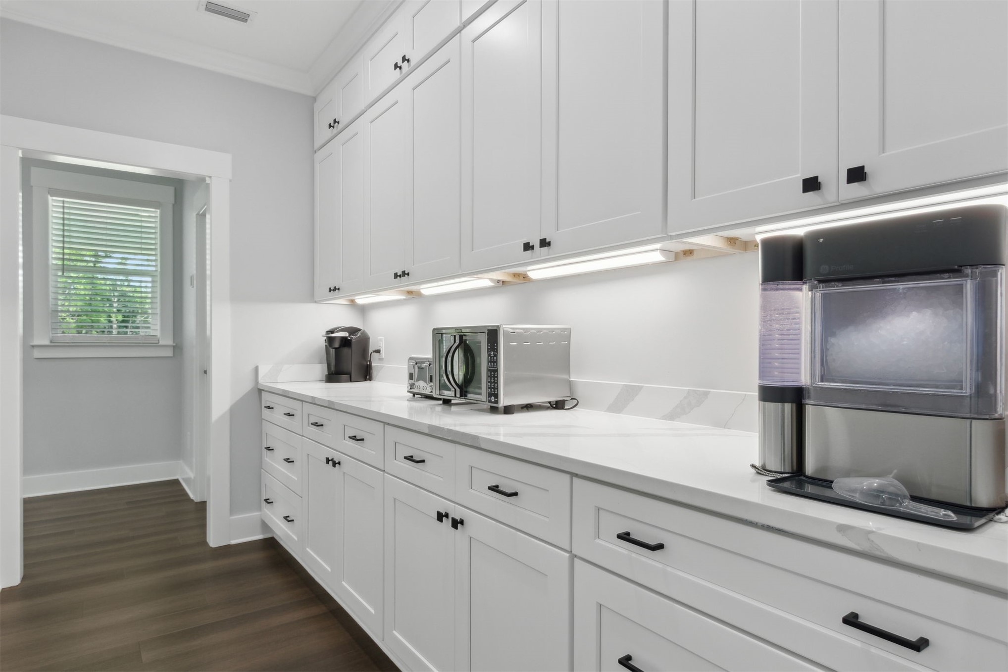 15550 County Road 108 Hilliard, FL 32046 - Photo 27 of 64 a kitchen with granite countertop white cabinets and a sink