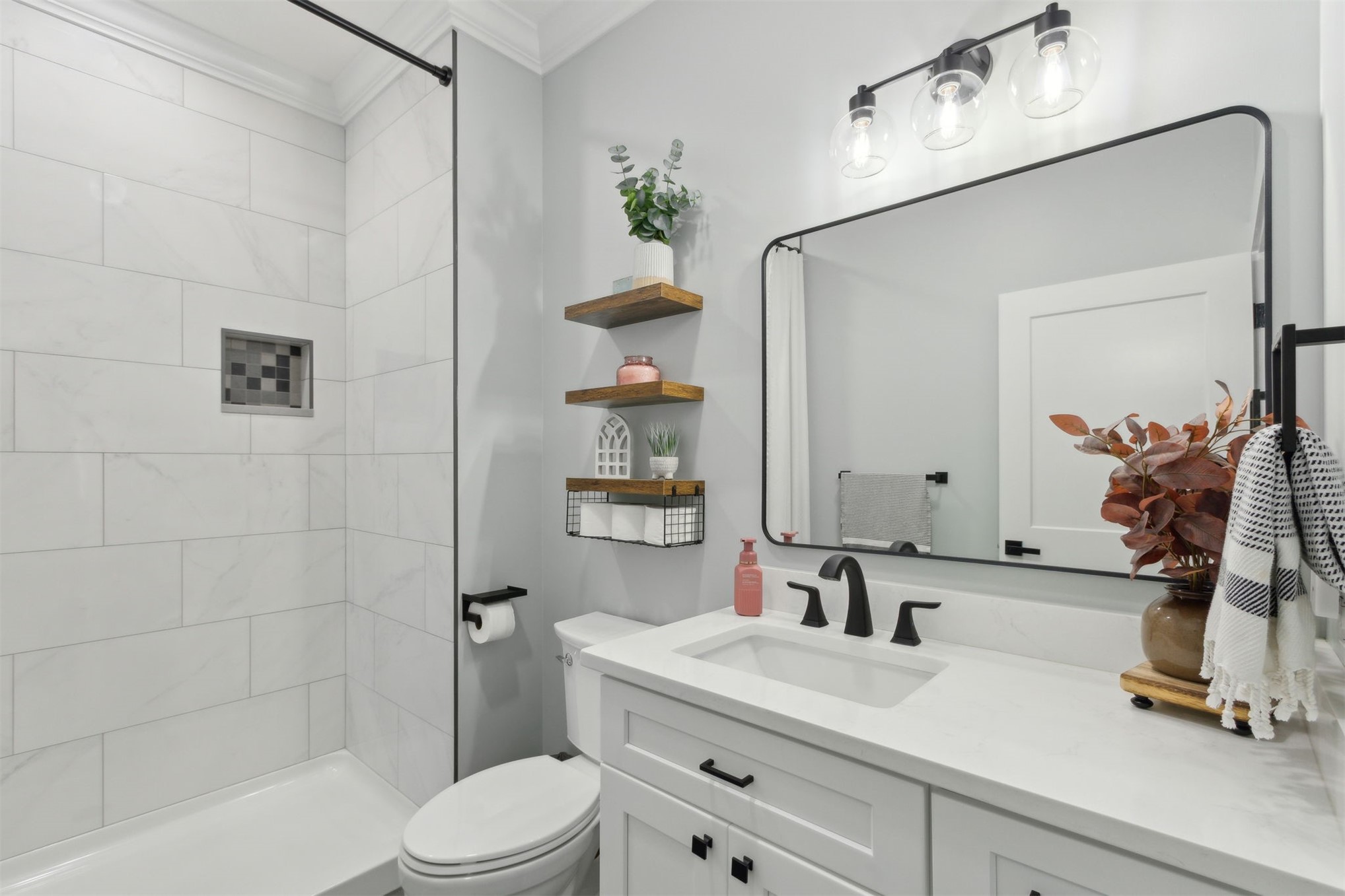 15550 County Road 108 Hilliard, FL 32046 - Photo 29 of 64 a bathroom with a sink a toilet and a mirror