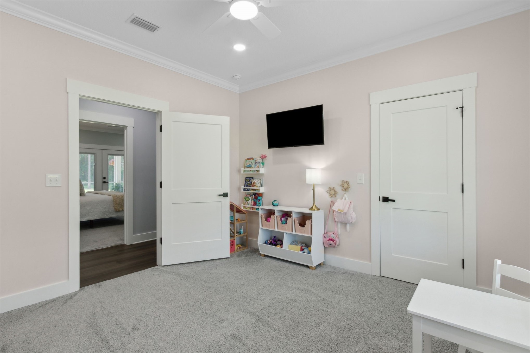 15550 County Road 108 Hilliard, FL 32046 - Photo 41 of 64 a view of a livingroom with a space & a flat screen tv