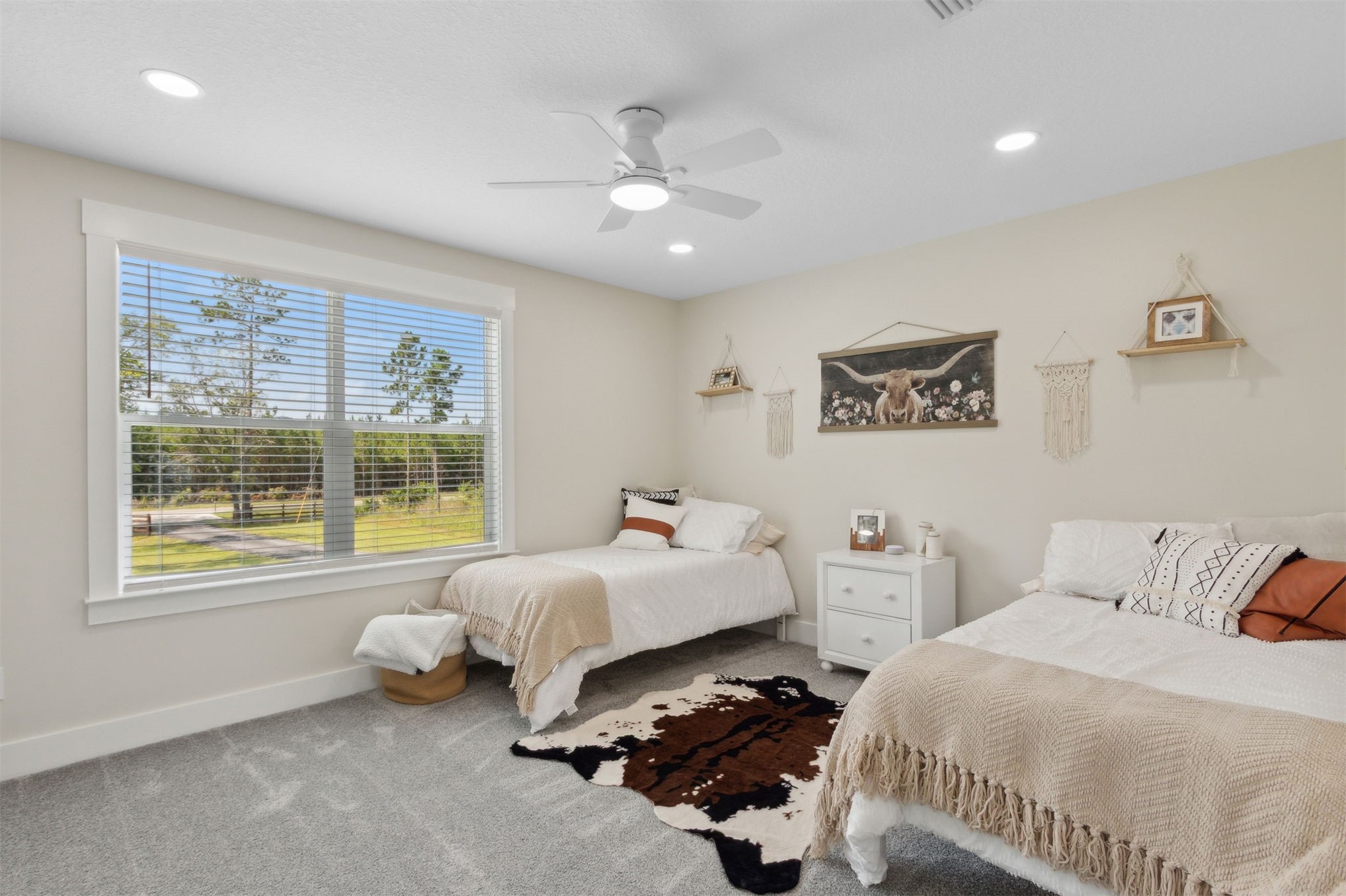 15550 County Road 108 Hilliard, FL 32046 - Photo 50 of 64 a bedroom with two beds and a window