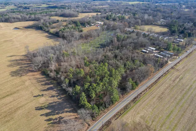 a view of balcony with furniture