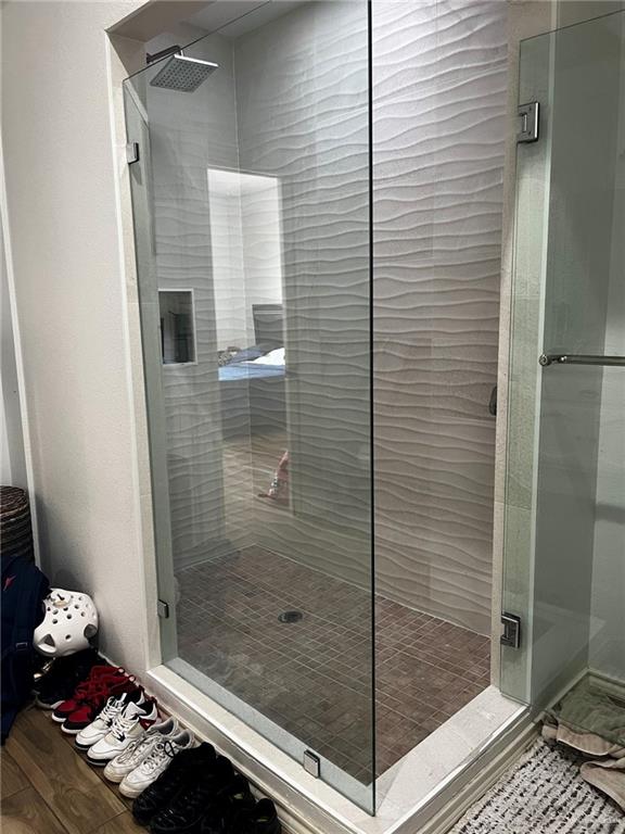 406 Rio Grande Drive Mission, TX 78572 - Photo 20 of 27 Full bath with a shower stall and wood finished floors