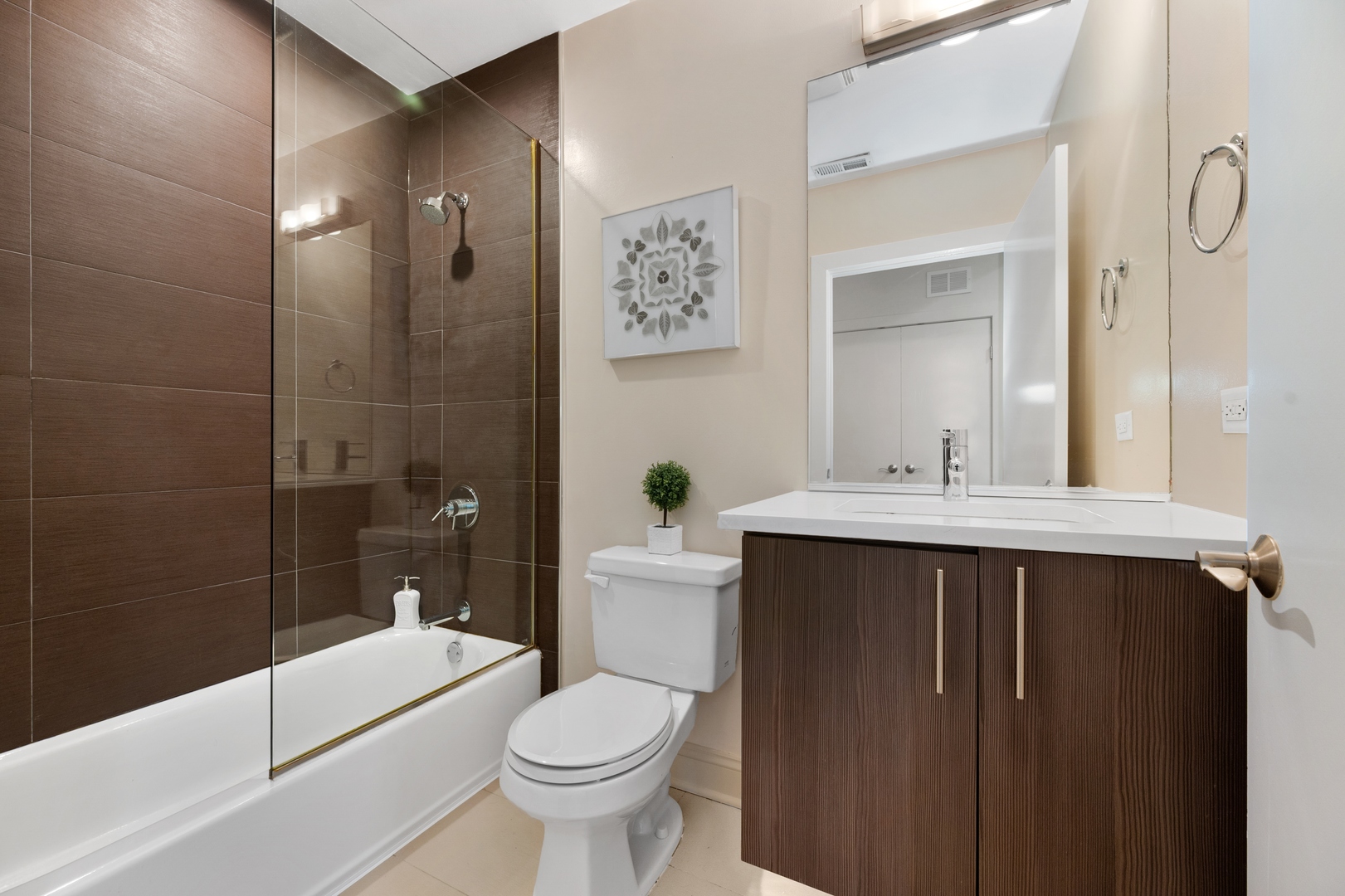 1850 West Division Street, Unit 2E Chicago, IL 60622 - Photo 16 of 22 a bathroom with a sink toilet and shower
