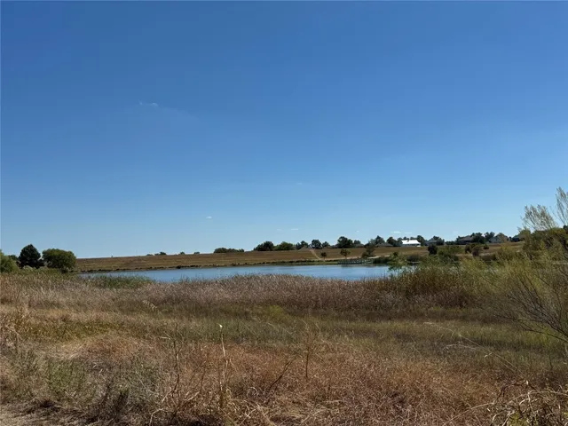 a view of a lake and mountain in the back