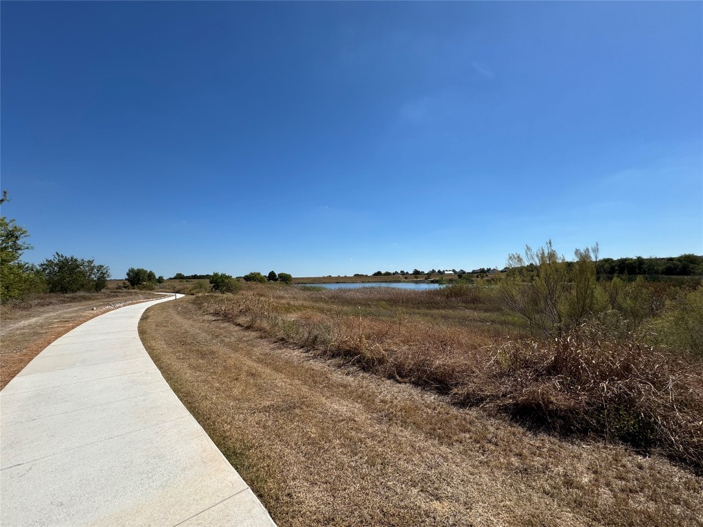 247 Simon Kyle, TX 78640 - Photo 22 of 23 a view of lake and mountain