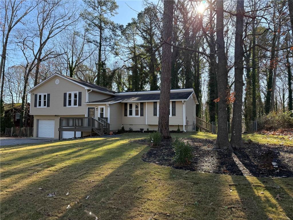 2801 Kellogg Creek Road Acworth, GA 30102 - Photo 2 of 28 a front view of a house with a yard
