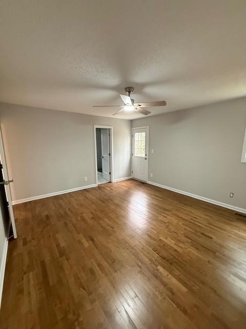 2801 Kellogg Creek Road Acworth, GA 30102 - Photo 25 of 28 a view of an empty room with wooden floor and a window