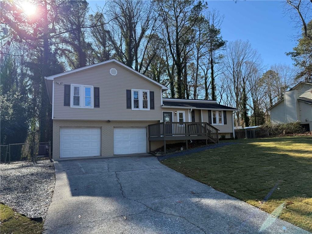 2801 Kellogg Creek Road Acworth, GA 30102 - Photo 3 of 28 a front view of a house with garden