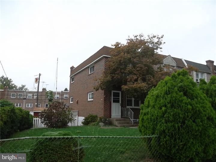 1925 Carter Road Folcroft, PA 19032 - Photo 2 of 25 a view of a house with yard and a garden