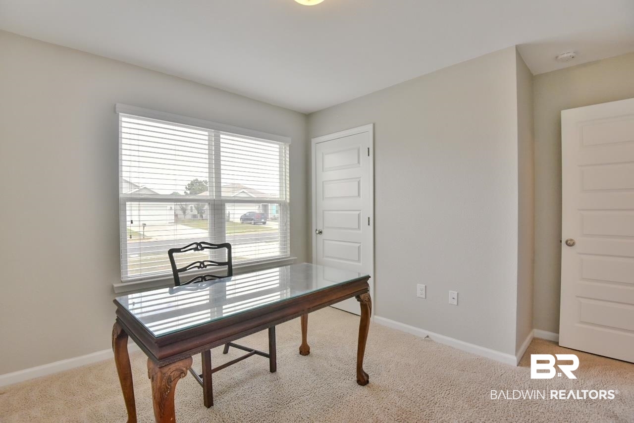 17430 Harding Drive Foley, AL 36535 - Photo 21 of 37 Office with baseboards and light colored carpet