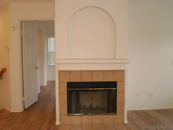 a living room with a fireplace