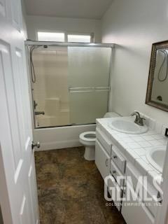 Undisclosed Address Bakersfield, CA 93313 - Photo 10 of 18 a bathroom with a granite countertop shower toilet and sink