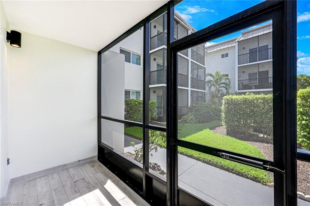 766 Central Avenue, Unit 117 Naples, FL 34102 - Photo 16 of 25 a view of a porch