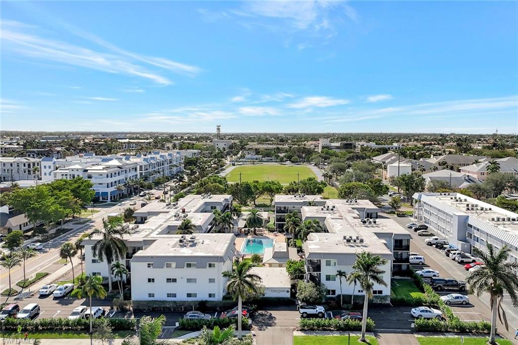 766 Central Avenue, Unit 117 Naples, FL 34102 - Photo 23 of 25 an aerial view of a city
