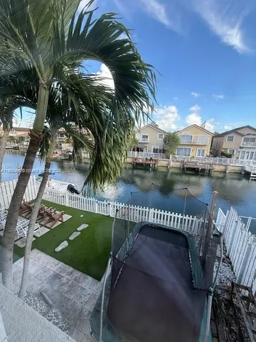 a view of a swimming pool and outdoor space