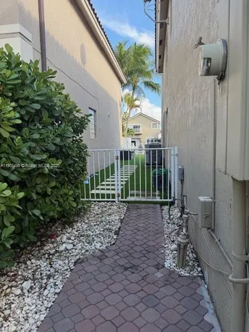 a view of a backyard with plants