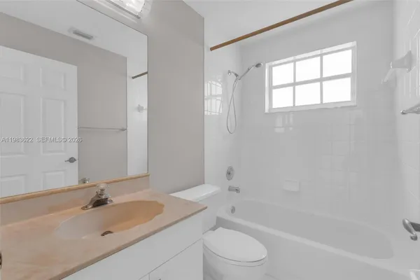 a kitchen with a stove and a microwave