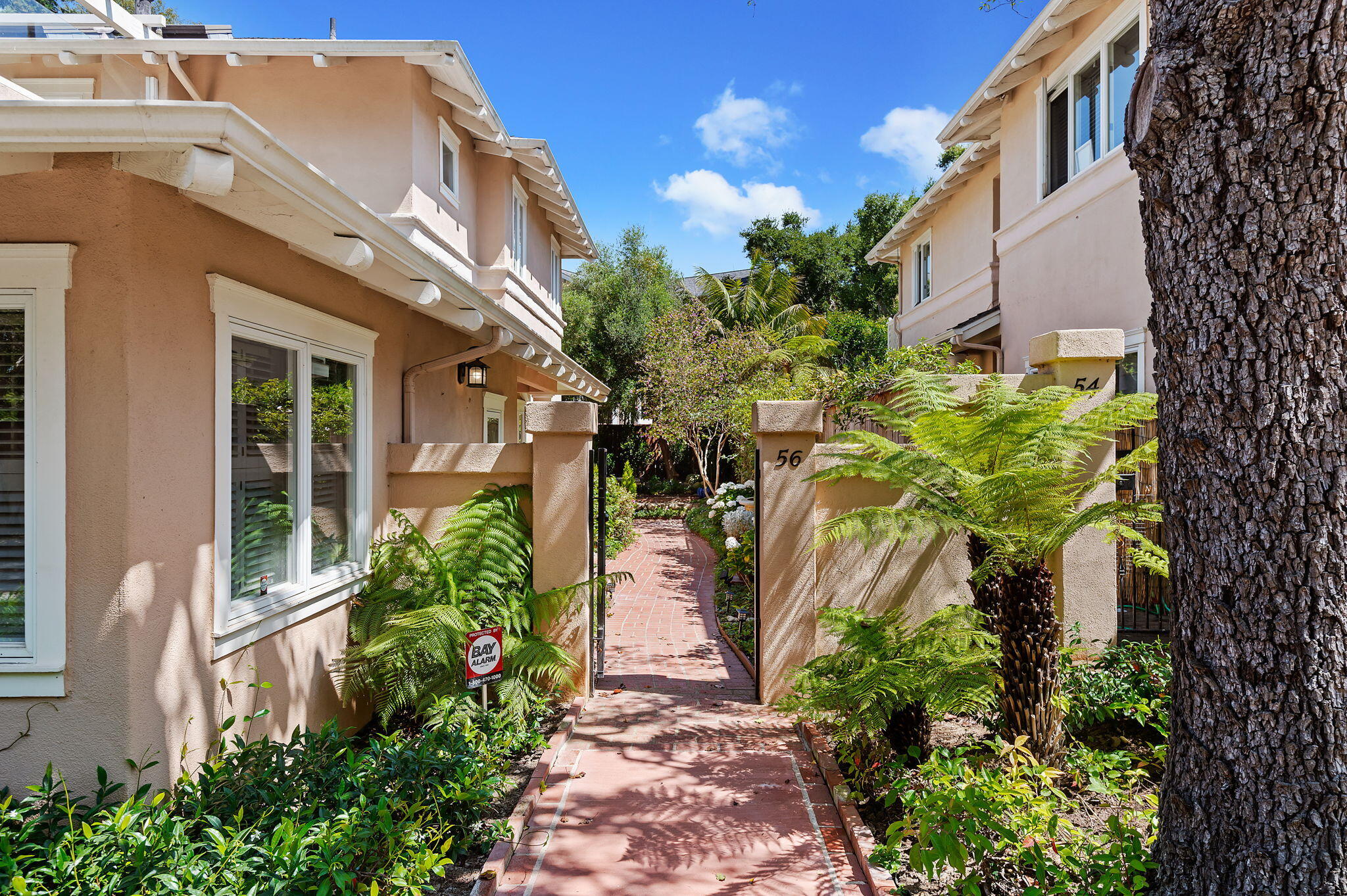 56 Olive Mill Road Santa Barbara, CA 93108 - Photo 2 of 28 a front view of a house with a yard
