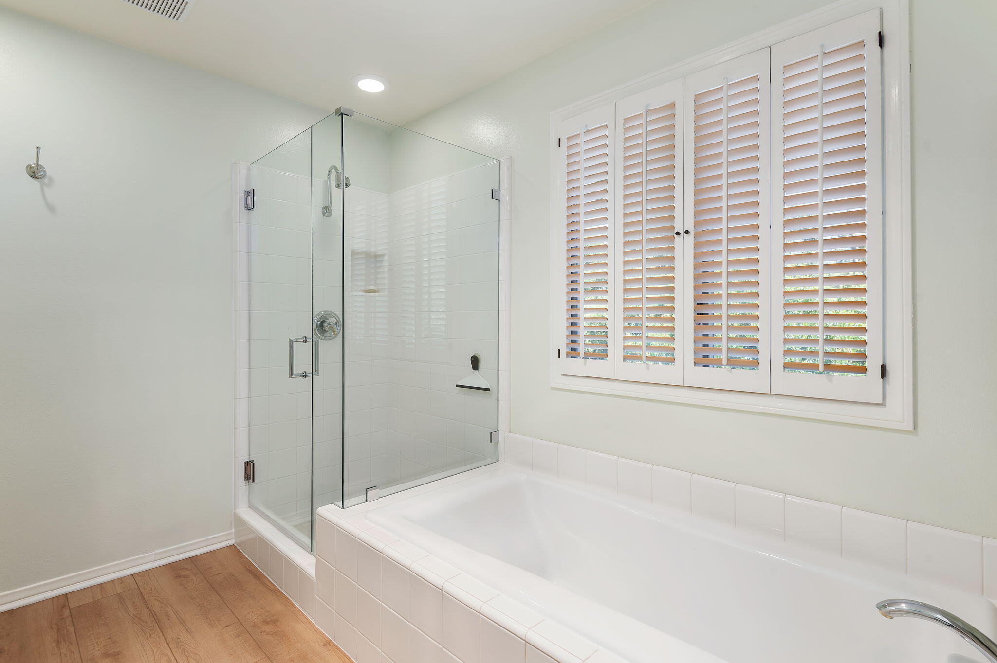 56 Olive Mill Road Santa Barbara, CA 93108 - Photo 22 of 28 a bathroom with a bathtub and a shower