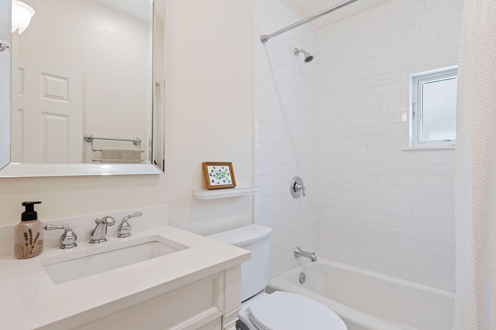 56 Olive Mill Road Santa Barbara, CA 93108 - Photo 28 of 28 a bathroom with a sink vanity mirror and toilet