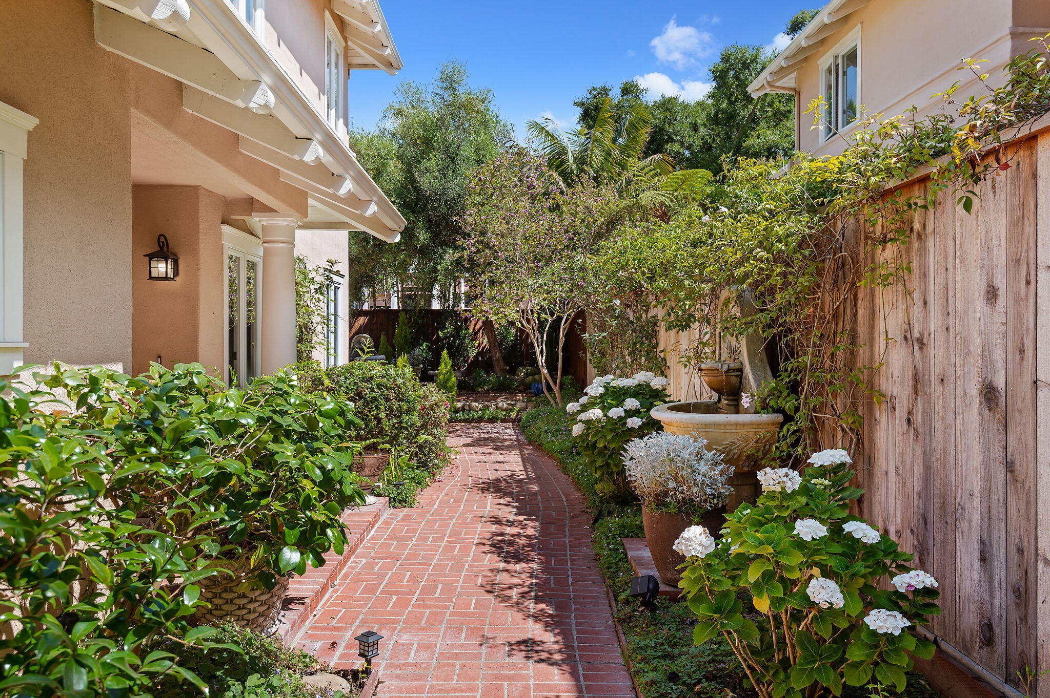 56 Olive Mill Road Santa Barbara, CA 93108 - Photo 3 of 28 a view of a garden with pathway