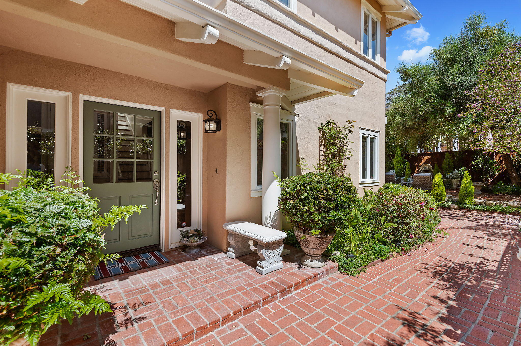56 Olive Mill Road Santa Barbara, CA 93108 - Photo 4 of 28 a view of a house with chair and potted plants