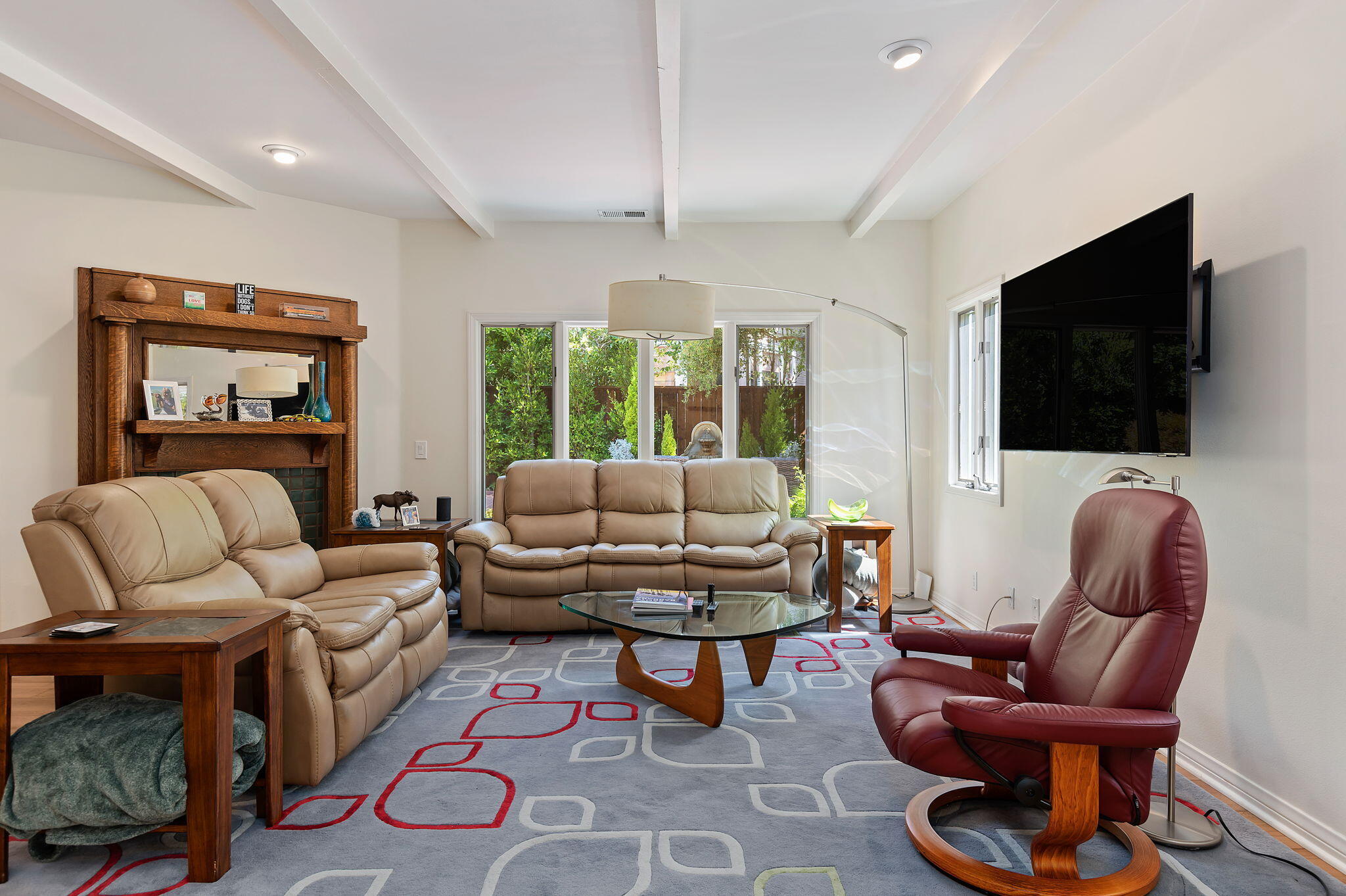 56 Olive Mill Road Santa Barbara, CA 93108 - Photo 5 of 28 a living room with furniture a flat screen tv and a window
