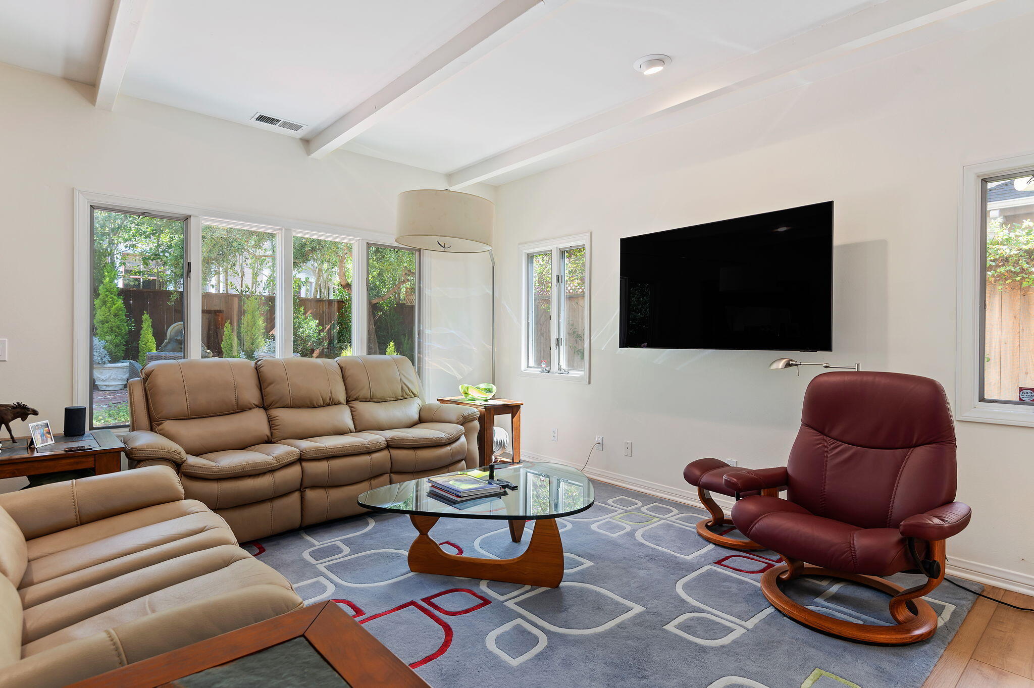 56 Olive Mill Road Santa Barbara, CA 93108 - Photo 6 of 28 a living room with furniture and a flat screen tv
