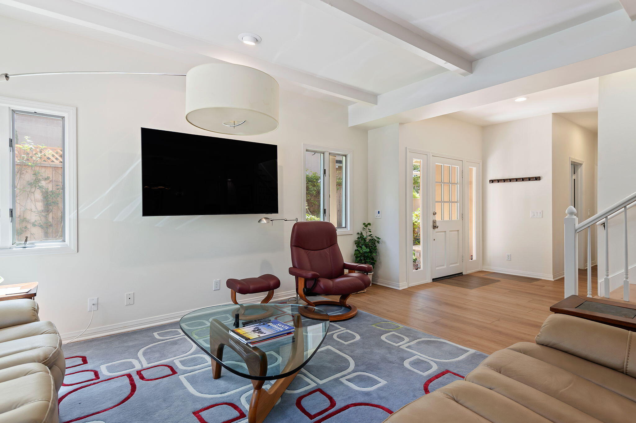 56 Olive Mill Road Santa Barbara, CA 93108 - Photo 7 of 28 a living room with furniture and a flat screen tv