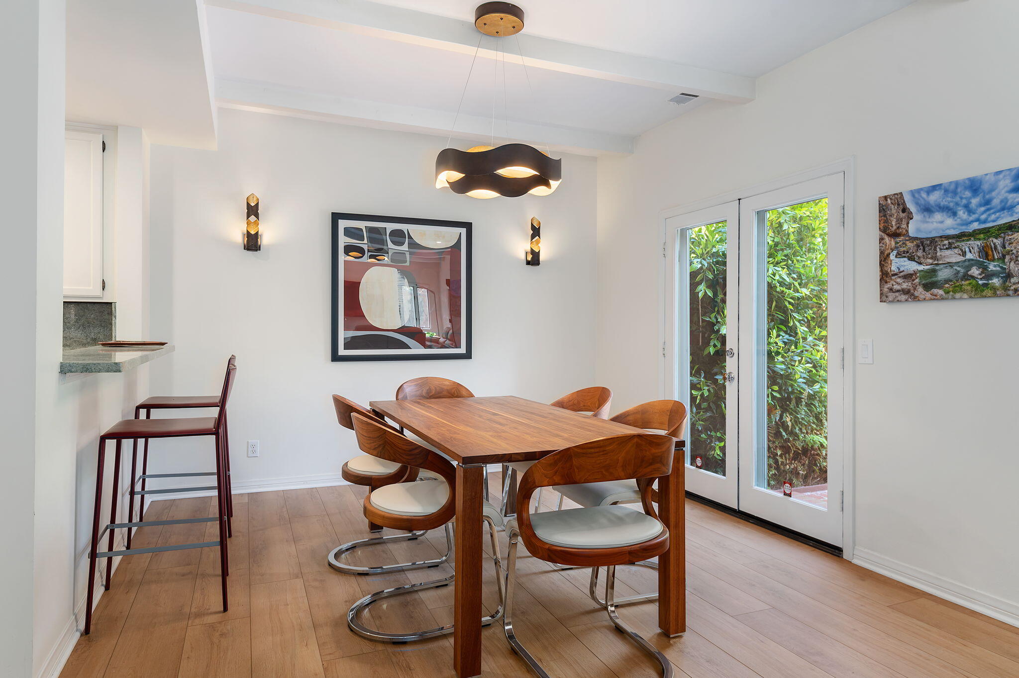 56 Olive Mill Road Santa Barbara, CA 93108 - Photo 9 of 28 a dining room with furniture and wooden floor