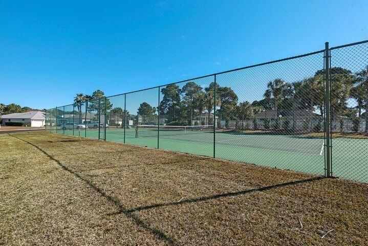 204 Bay Tree Drive Miramar Beach, FL 32550 - Photo 6 of 11 a view of a road with a big yard
