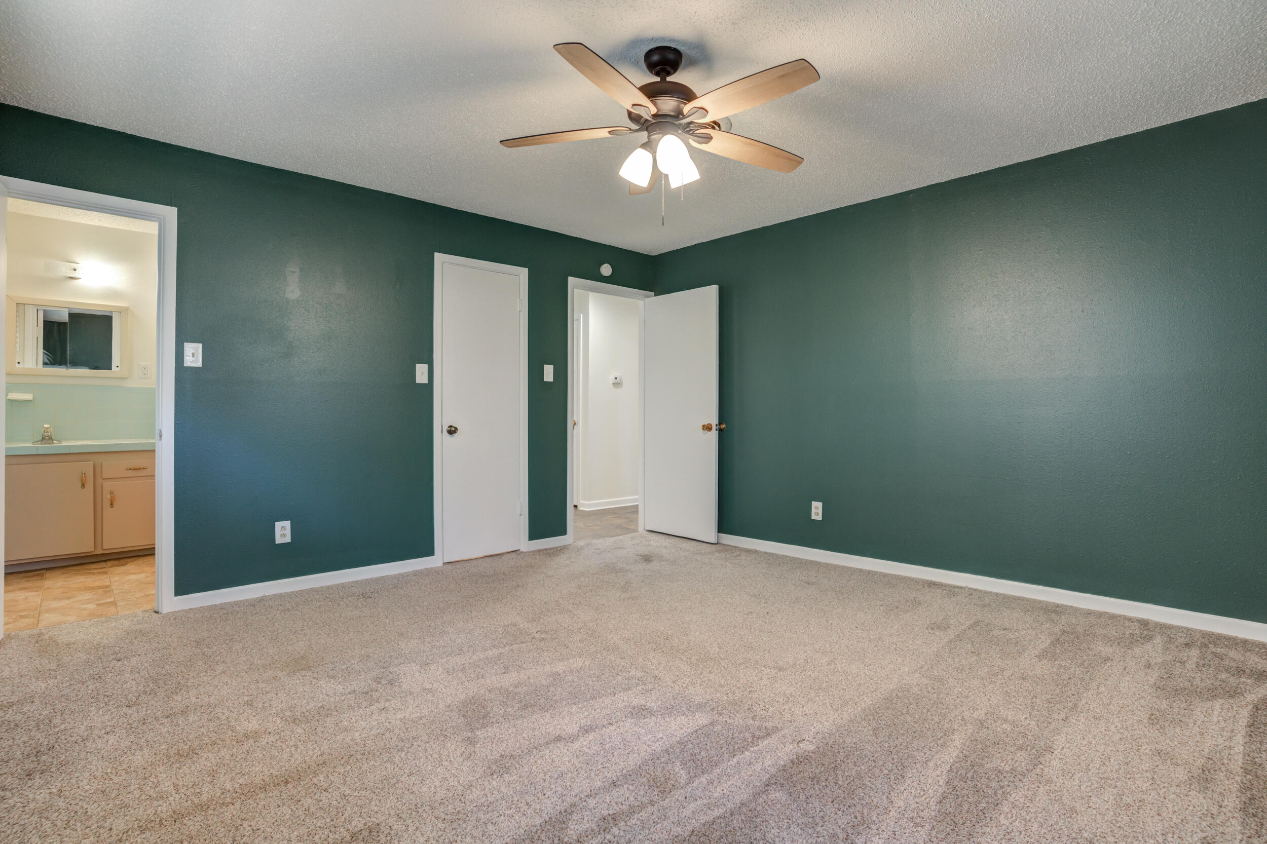 5403 8th Street Lubbock, TX 79416 - Photo 12 of 30 a view of a room with a ceiling fan