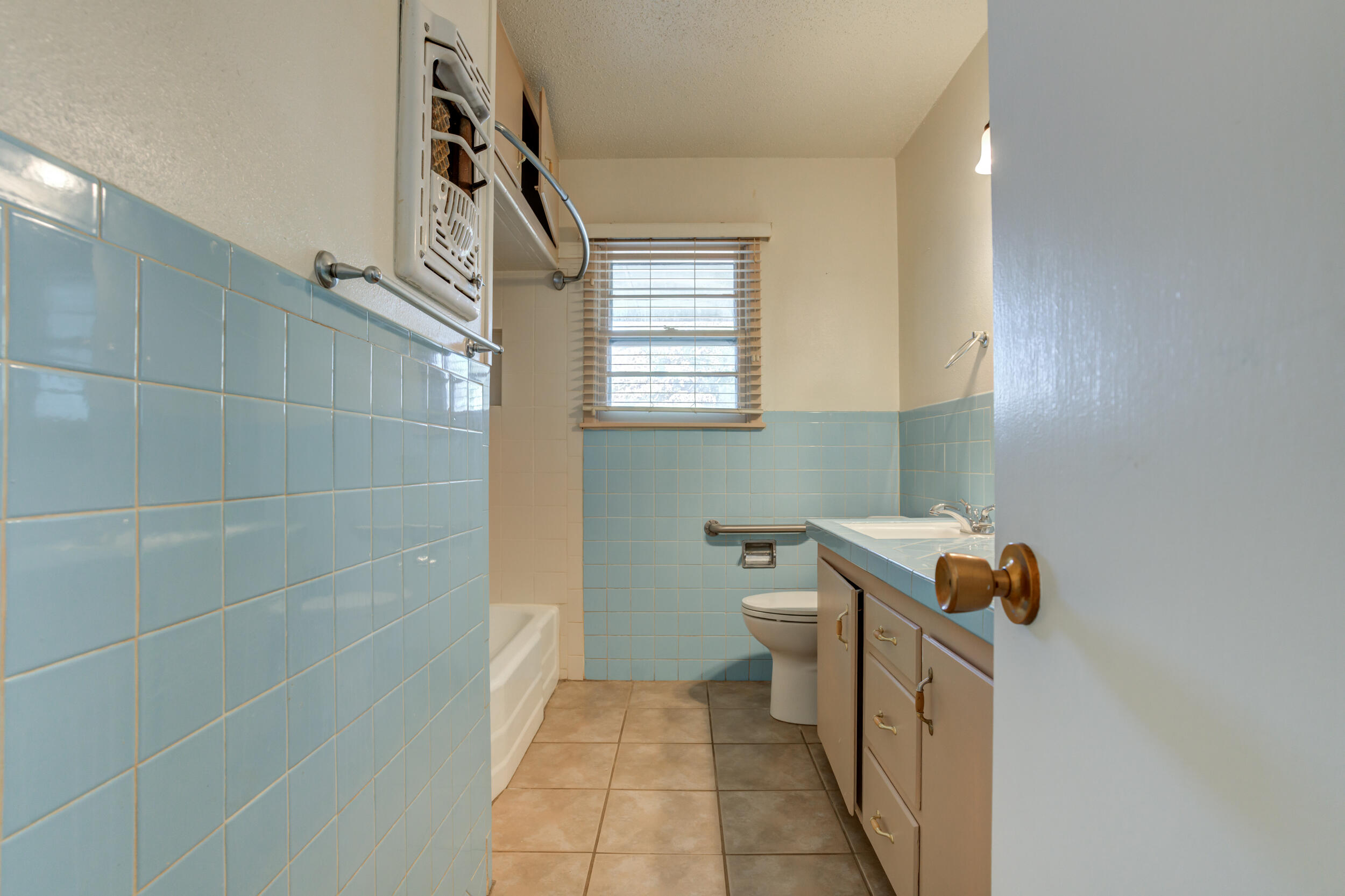 5403 8th Street Lubbock, TX 79416 - Photo 18 of 30 a bathroom with a toilet