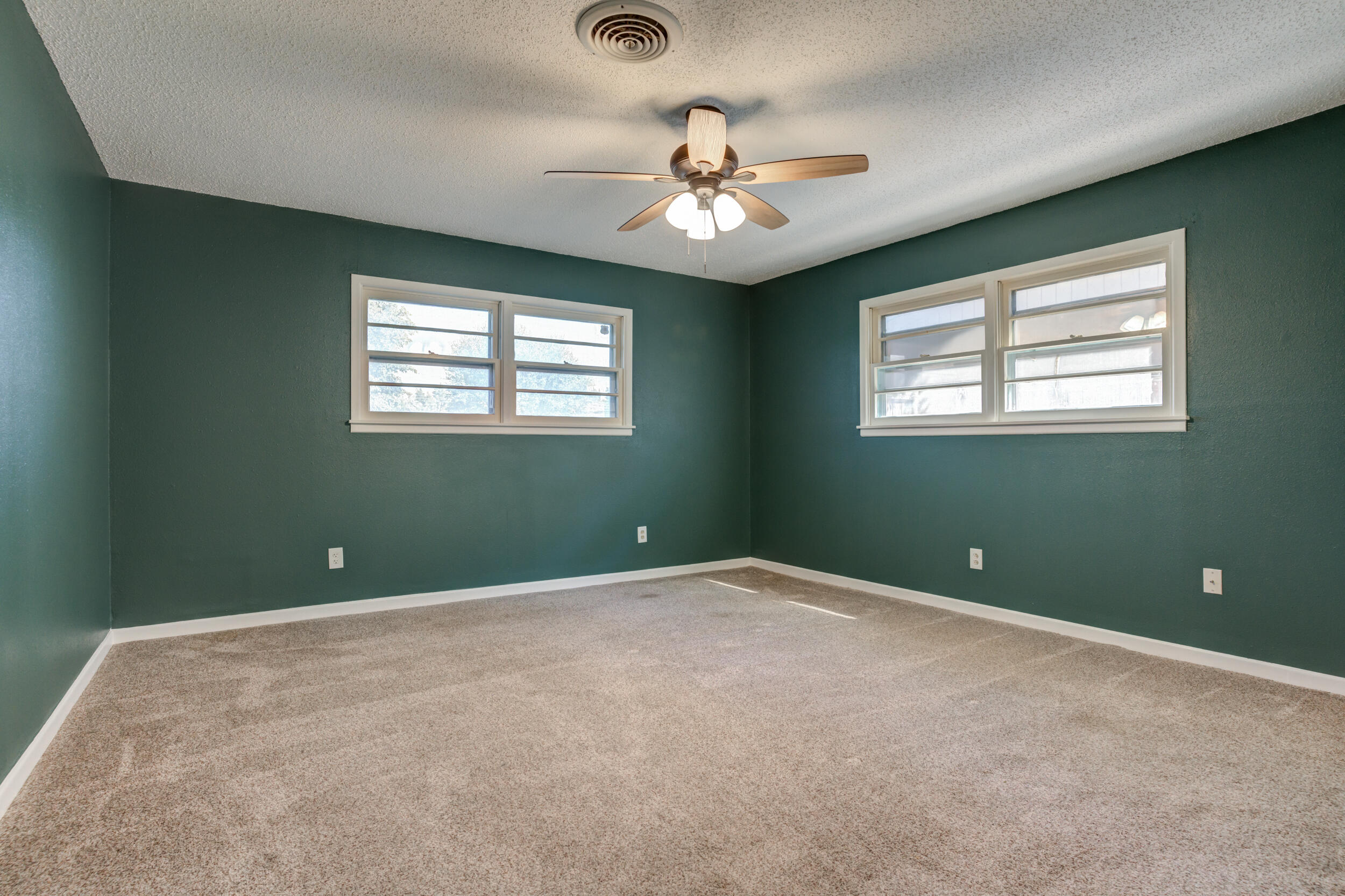 5403 8th Street Lubbock, TX 79416 - Photo 10 of 30 a view of an empty room with a window