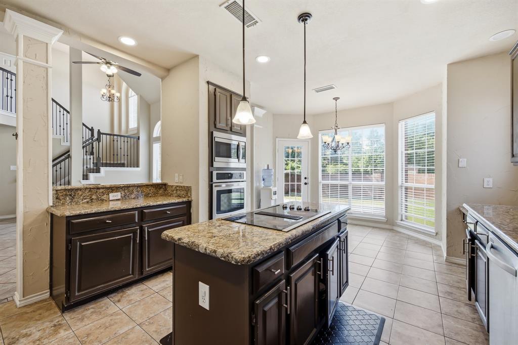 1911 New Haven Road Grapevine, TX 76051 - Photo 20 of 39 Updated stainless steel oven and microwave, cooktop needs to be replaced.