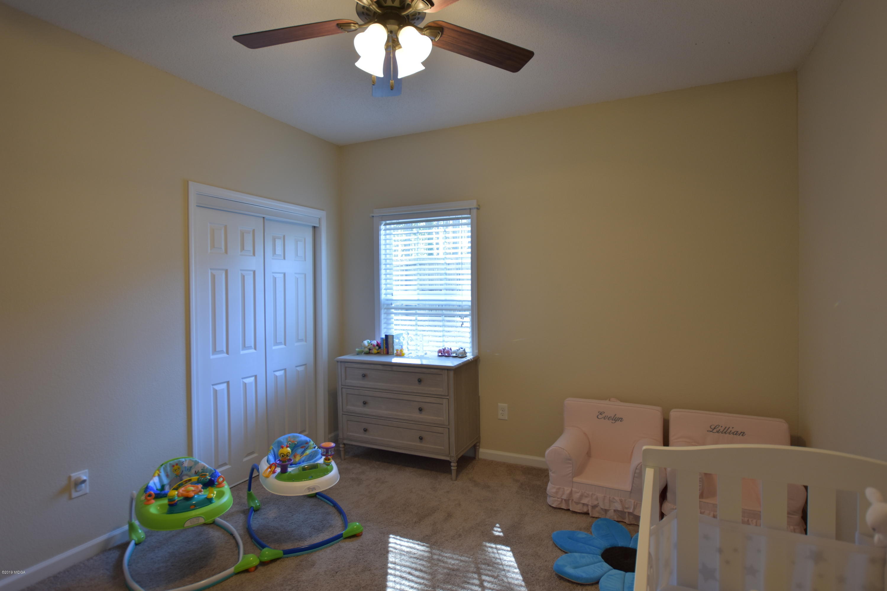 262 Ridge Point Way Macon, GA 31220 - Photo 16 of 27 a room with toys and wooden floor
