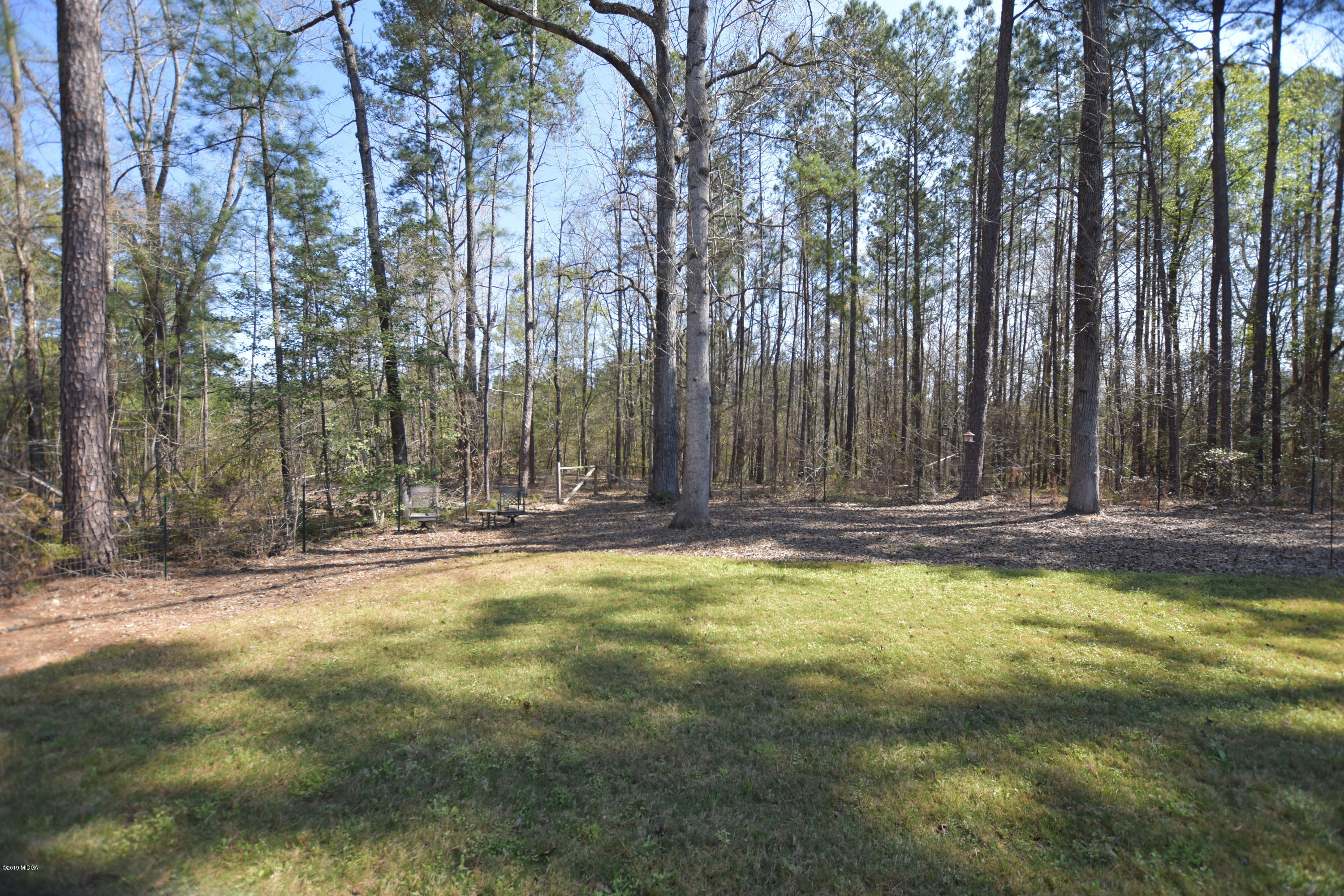 262 Ridge Point Way Macon, GA 31220 - Photo 24 of 27 a view of swimming pool with large trees