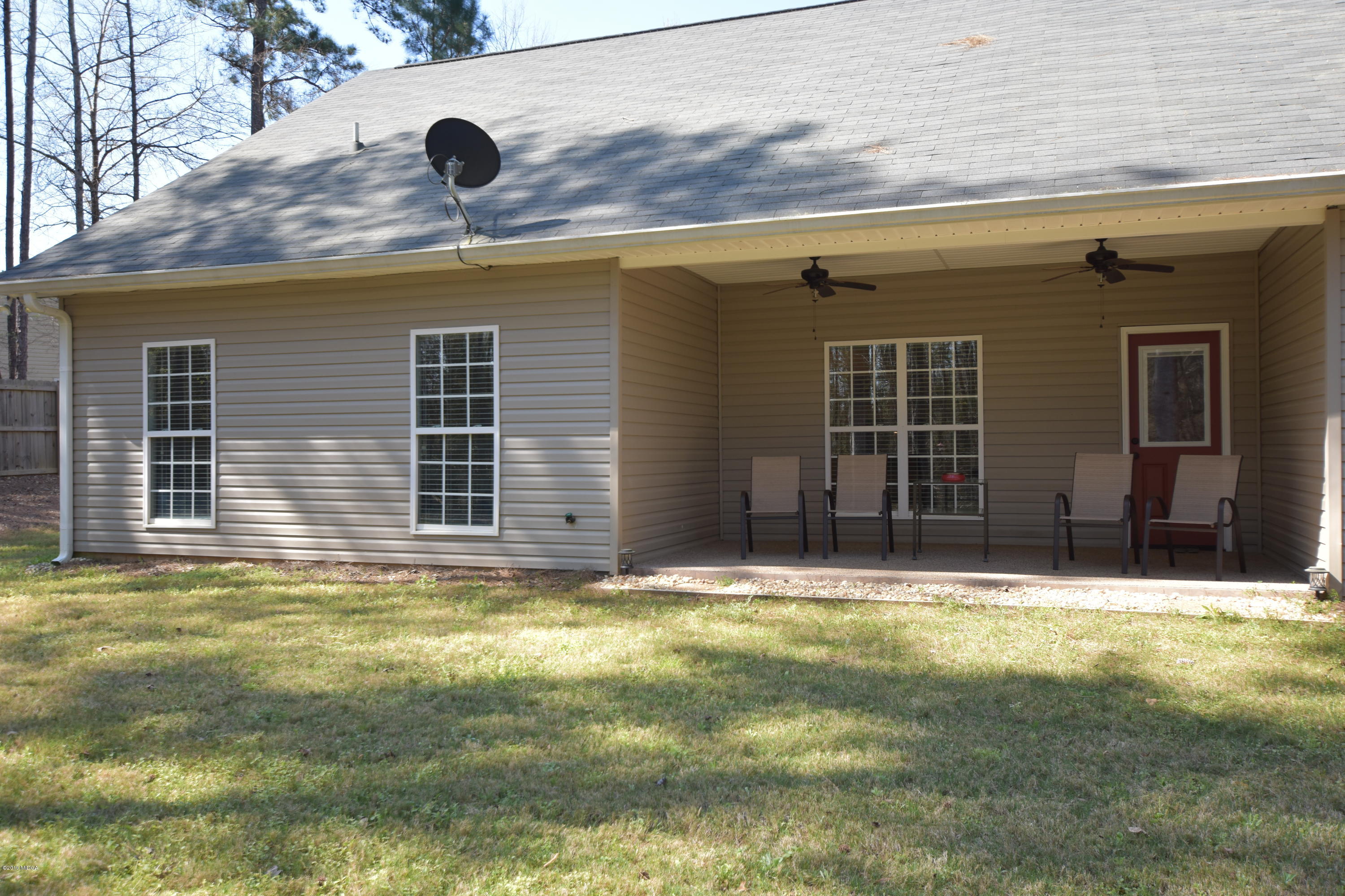 262 Ridge Point Way Macon, GA 31220 - Photo 26 of 27 a view of a brick house with a large window