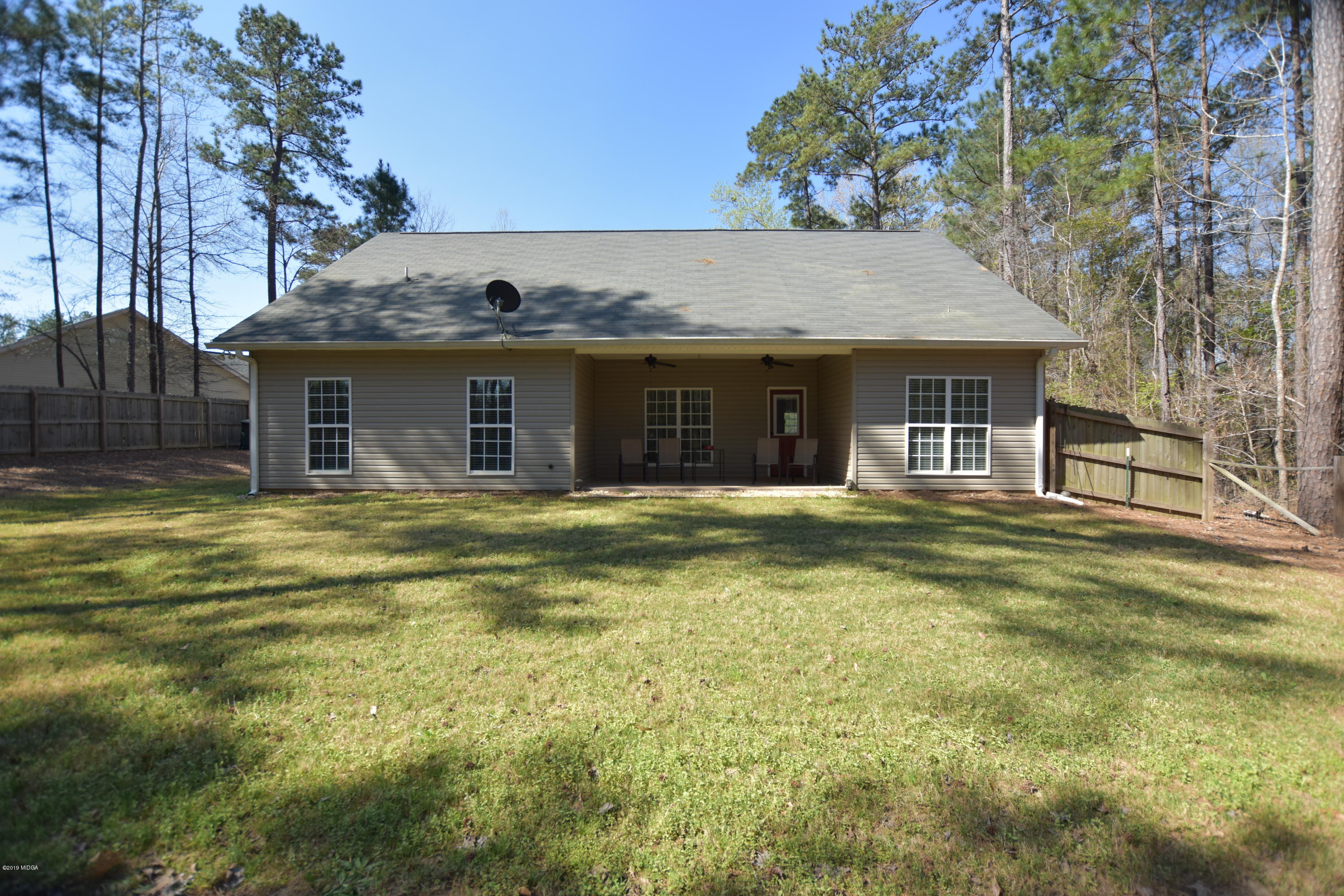 262 Ridge Point Way Macon, GA 31220 - Photo 27 of 27 a view of a house with a swimming pool
