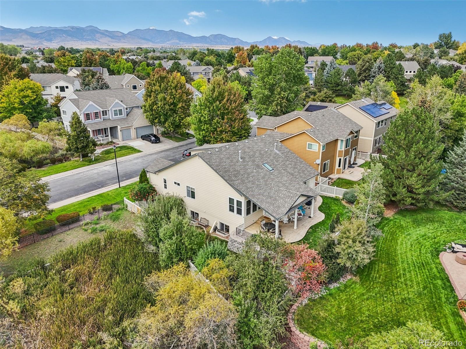 6060 Deframe Court Arvada, CO 80004 - Photo 42 of 45 an aerial view of a house with a garden