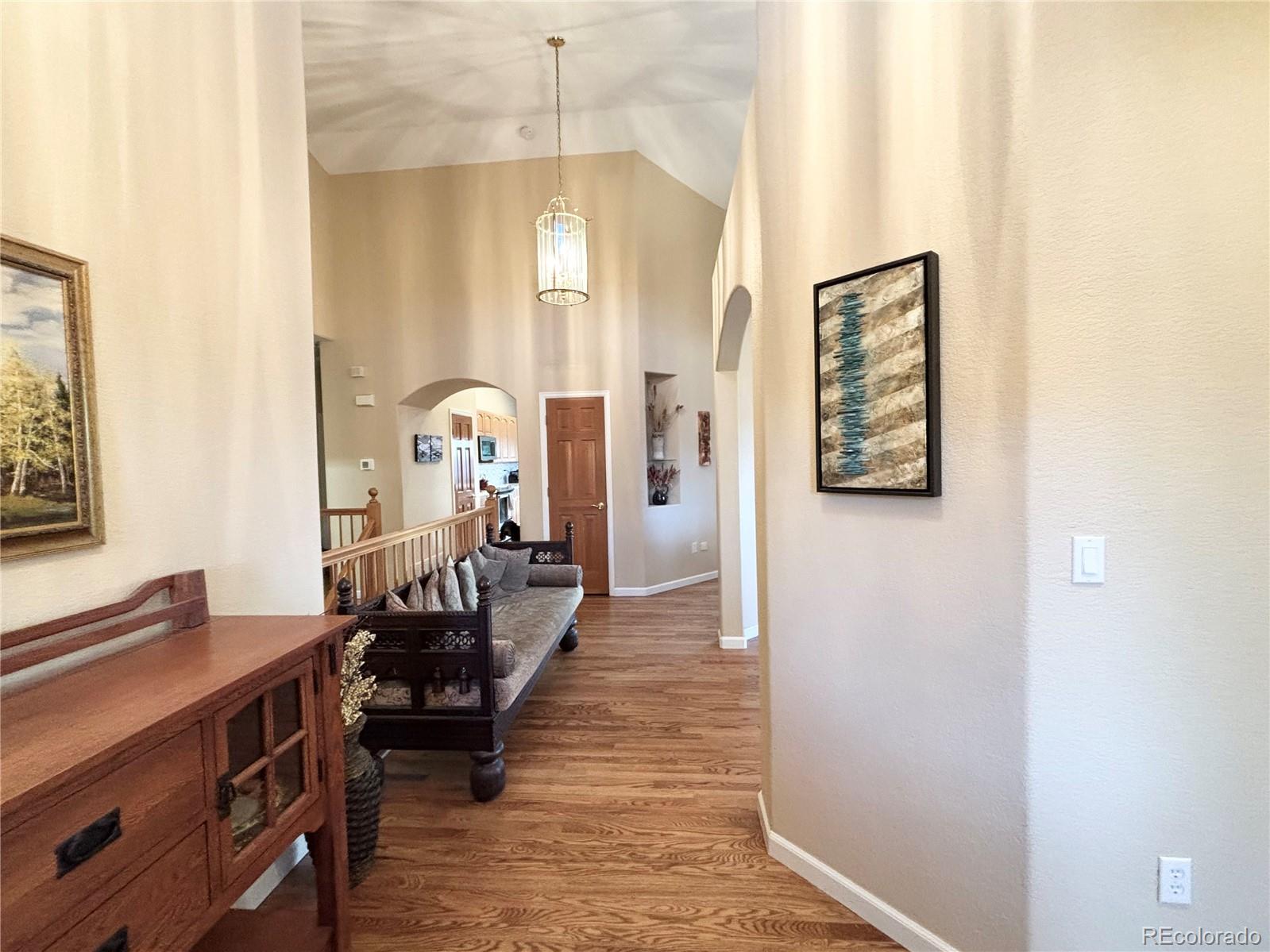 6060 Deframe Court Arvada, CO 80004 - Photo 5 of 45 a very nice looking room with a large window