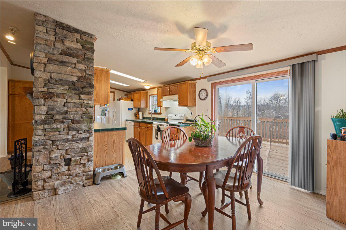 230 Cedar Flat Road Warfordsburg, PA 17267 - Photo 11 of 44 a dining room with furniture and window
