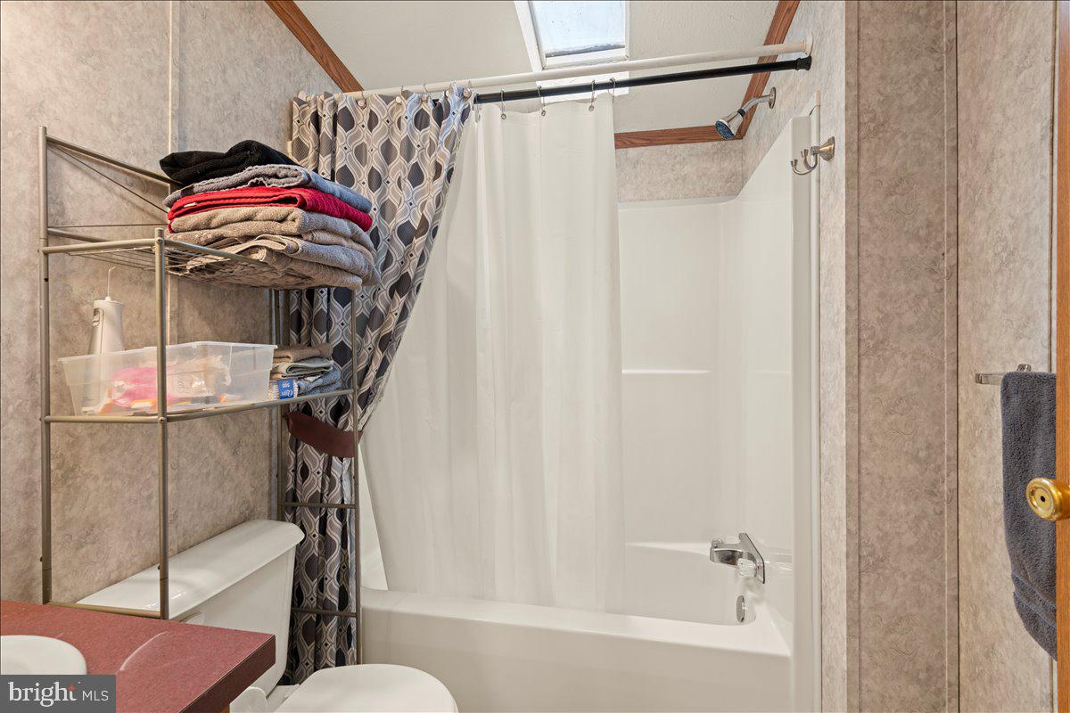230 Cedar Flat Road Warfordsburg, PA 17267 - Photo 20 of 44 a view of a bathroom with a tub and shower