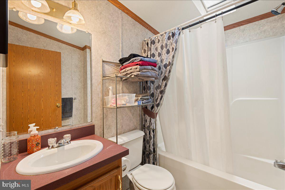 230 Cedar Flat Road Warfordsburg, PA 17267 - Photo 21 of 44 a bathroom with a sink toilet and shower