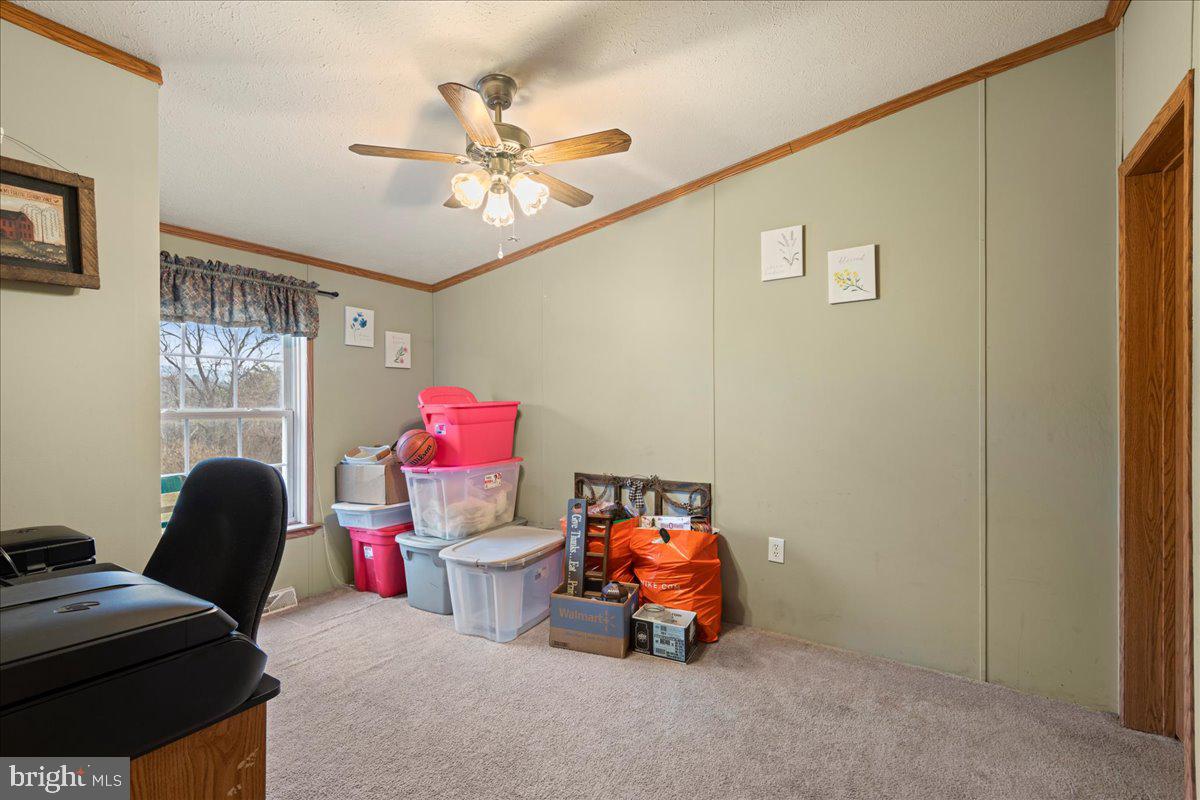 230 Cedar Flat Road Warfordsburg, PA 17267 - Photo 22 of 44 a living room with furniture and a window