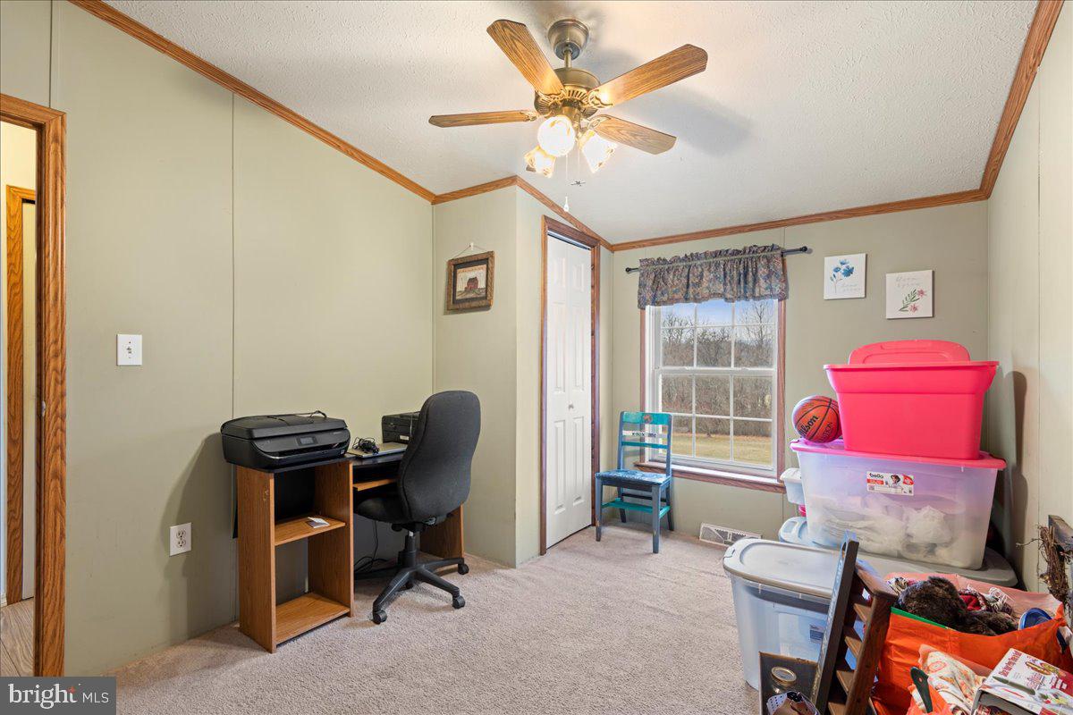 230 Cedar Flat Road Warfordsburg, PA 17267 - Photo 23 of 44 a view of a workspace with furniture and a window